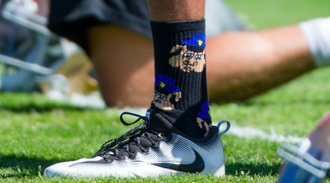 kaepernick-socks-pig-in-a-cops-hat.png