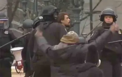 Rhodes misbehaving at a protest. He is a member of the Resistance in Portland.