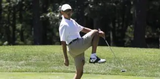 President Barack Obama reacts as he misses a shot while golfing on the first hole at Farm Neck Golf Club in Oak Bluffs, Mass., on the island of Martha's Vineyard on Sunday, Aug. 11, 2013. (AP Photo/Jacquelyn Martin)