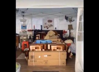 Homeless woman conducts a tour of her tent in Skid Row LA