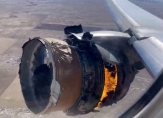 Stunning video of Boeing 777 as engine blows, dropping parts below