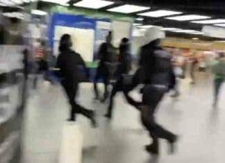 French police beat woman running into mall without a vaccine passport