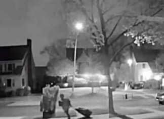 Chilling Video of Male Rushing Down a Street with a Murdered Woman in a Bag