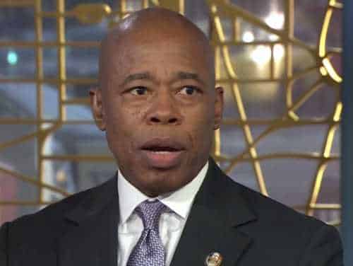 NextImg:Mayor Adams in Court: Drop NYC's Sanctuary Status