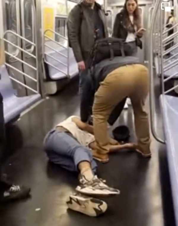 NextImg:Former Marine and Passengers Helping Subdue Neely Put Him in a Recovery Position