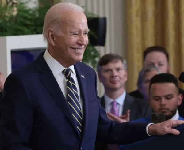 NextImg:In Response to an Impeachment Inquiry, Biden Strolls On Smirking