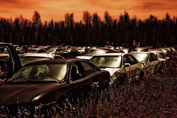 NextImg:The EV Bubble Is Deflating in Auto Yards Everywhere