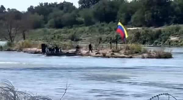 NextImg:Illegal Crossers Plant Venezuelan Flag on Texas Island