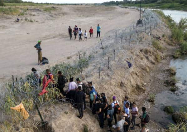 Owned by China? 160 Chinese Communists Coming Through Daily