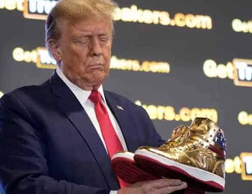 On the Day He Loses $400M+, DJT Trumpets Gold Sneakers