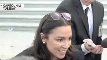AOC Boasts Farce Trial Is the Equivalent of an Ankle Bracelet