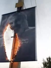 Iranian Regime Plasters Posters Around of Hassan Nasrallah, Iranians Burn Them
