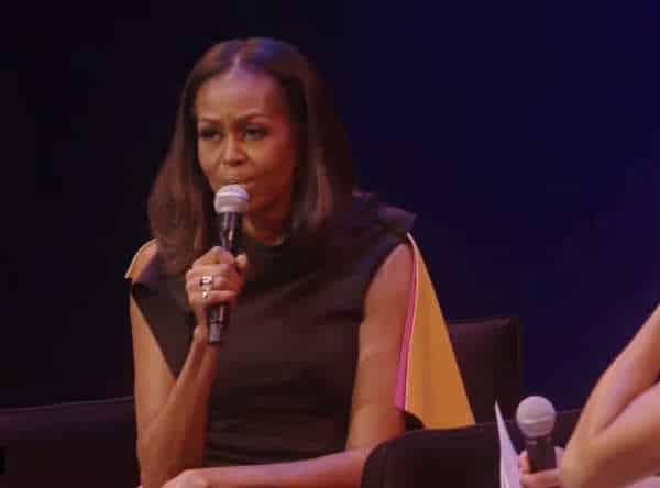 Michelle Obama Blames White People for Straightening Her Hair